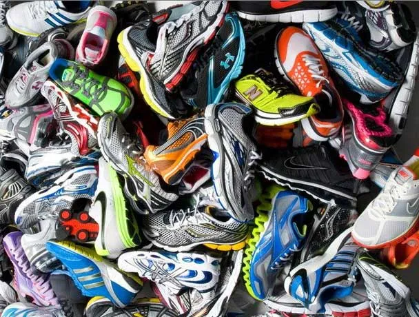 a pile of colorful shoes sitting next to each other.